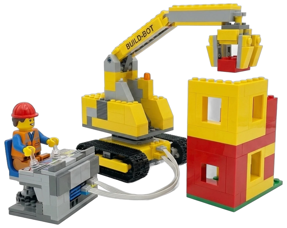 Lego operator running a BUILD-BOT machine that assembles a building